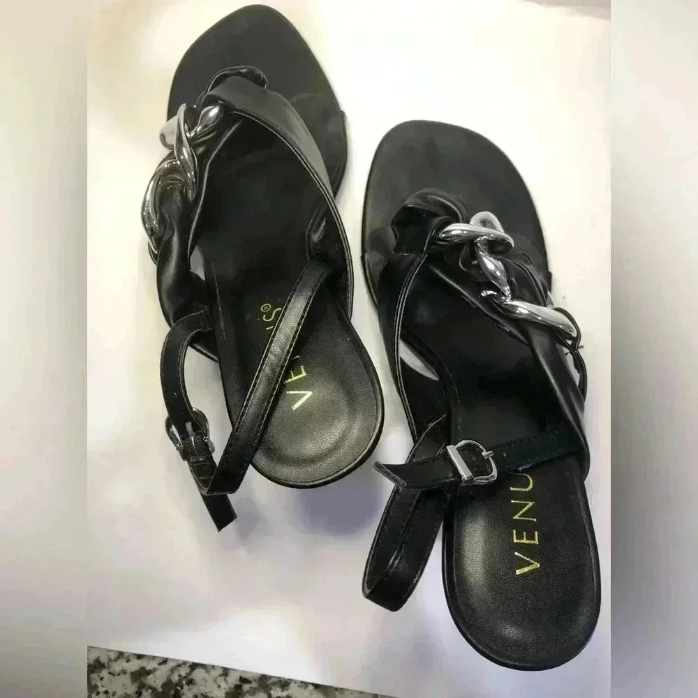 Black and silver heels size 7.5